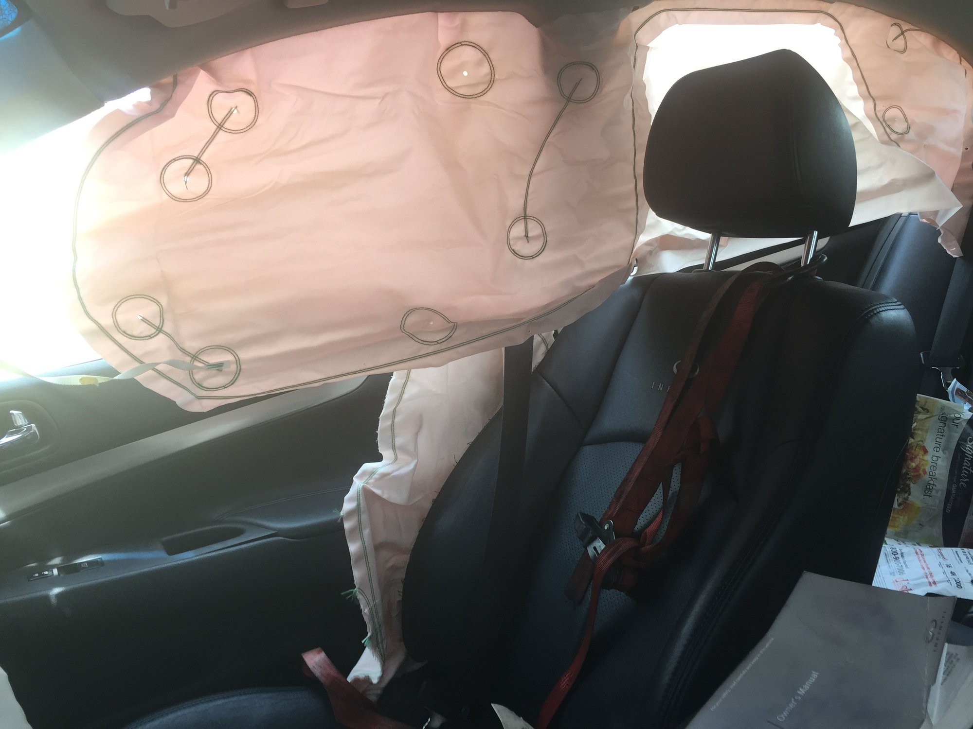 Where do the airbags deploy from in a side impact accident? MyG37