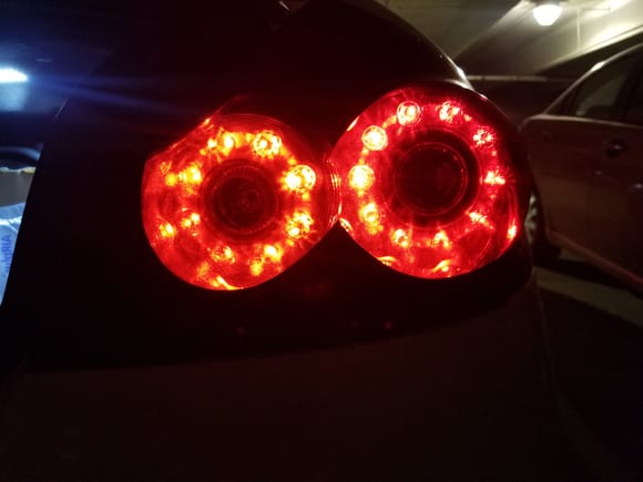 Factory oem lights with bluebat gtr cutout overlay. The new taillights still utilize the factory led dots for brake lights
