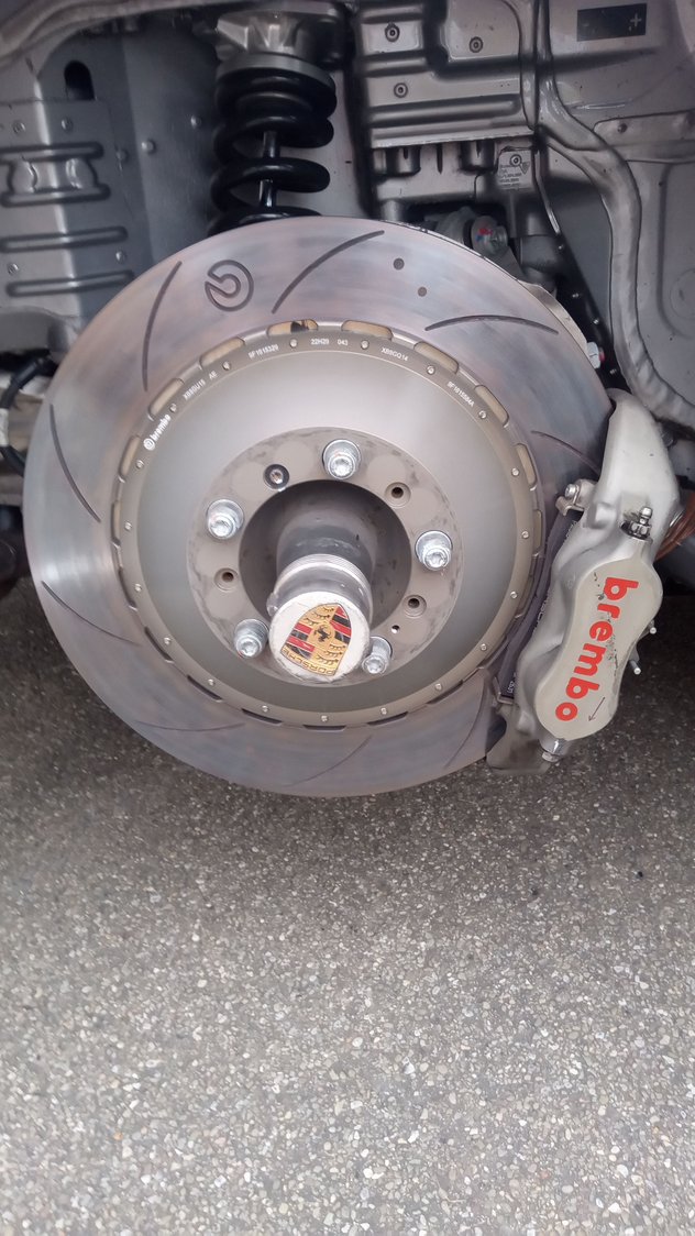 Front brake on a very fast Porsche. I think the diameter is larger than my Classic Mini wheel...😱