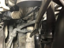 Intake manifold next to valve cover vent hose