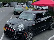 Albert hanging out with friends, including a Gen 2 JCW in the background.