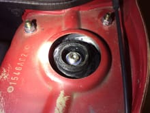 right side: cracking of coating on strut mount, as well as heavy doming after a 9 miles drive