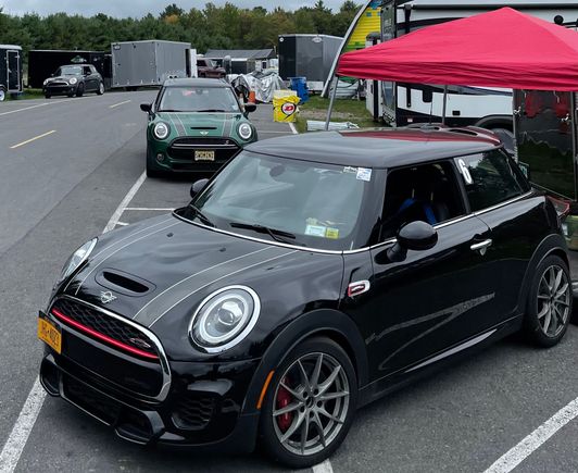 Albert hanging out with friends, including a Gen 2 JCW in the background.