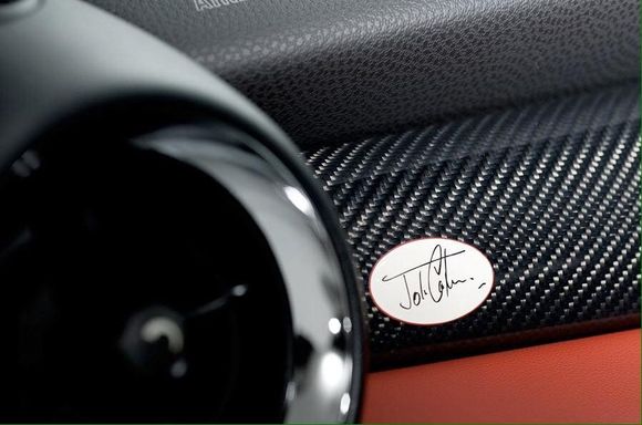 Lots of carbon fiber and the dash plaque