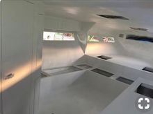 From the galley looking forward. There will be a fold up table with a push to open drawer for garbage. The table should sit 6. It’s done  and there are pictures on the thread, but won’t put in until we finish the cabin 