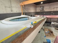 The outside edge of the hull will be routered to have a radius and glass lamination added before final finish work.
