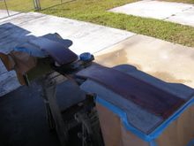 Boarded it real good and went for a flood coat, no good it runs down the bevel on the hump and doesn't build up for me. Needed it tho so there was no low spots to keep the resin from bleeding under the stencils.