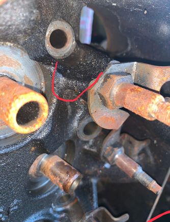 Marked in red is the difference between the two heads on the end 2 bolts that would normally be the middle length head bolt. It’s recessed on my old 496 heads but level with the rest on the new head. 