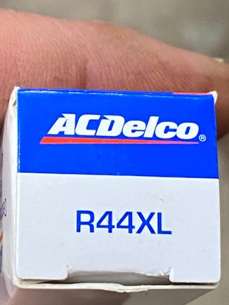 Plug that screws into head. Gasket type