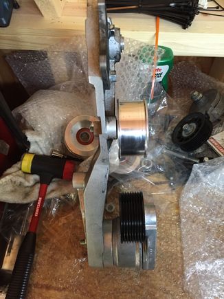 Here you can see how the bracket is bent the tensioner is crooked compared to the other pulleys. I can't see it from the front I only noticed it from laying under the truck and looking up from the crank to the tensioner...