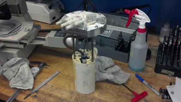 Aluminum Fuel Pump Mount. To be welded into the fuel cell.