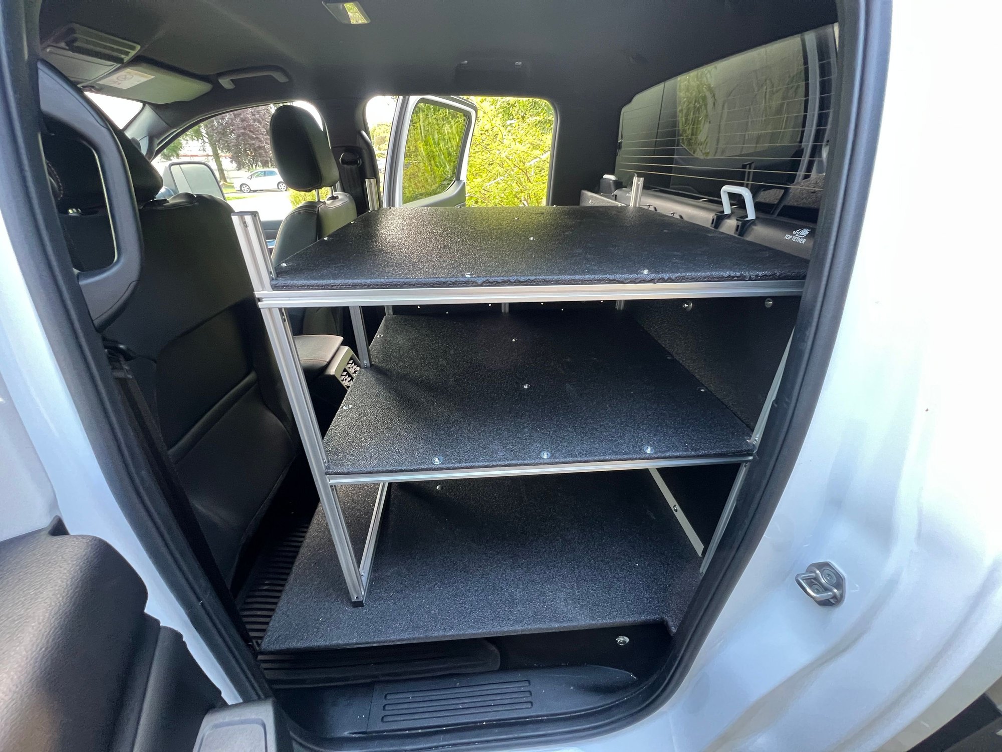 Little shelf behind the driver seat