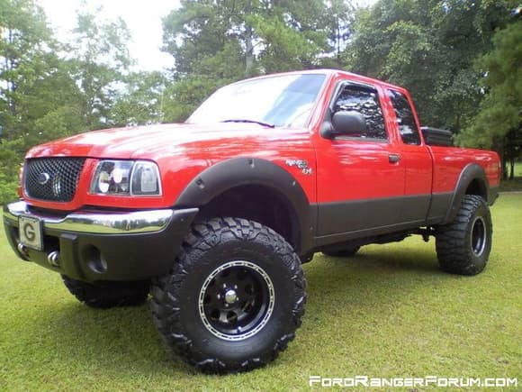 33x13.50x15 Nitto Mud Grapplers, 06  Flares, Line-X'ed rockers, retrofitted projectors