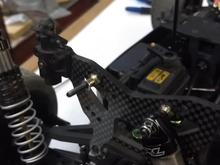 Shaved stock shock mounts to space shocks away from tower and upper arms.