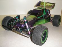 Kyosho Turbo Optima "Barney" Project

Details:

-Kyosho Turbo Optima w/belt drive conversion
-Aluminum parts polished &amp; anodized
-Bullistorm 60A ESC &amp; Tacon 11T/3200 kV brushless motor
-Axial Rockster wheels with 5mm axle adapter washers
-Proline Caliber 2.2" tires

Mods &amp; hop-ups:

-Titanium HPI &amp; Schumacher turnbuckles, 4.8mm ball studs &amp; ball cups throughout
-Kyosho Maxxum front control arms; GPM C-Carriers for Kyosho Lazer
-Duratrax Maximum steering knuckles #DTXC9953
-Duratrax DTXC8100 chrome outdrives
-GPM DF02 rear control arms #2056
-Kyosho Lazer 68mm CVD's
-Rare alloy rear hubs/carriers for Kyosho Optima
-4 Kyosho Gold long shocks (reanodized) with custom carbon shock towers
-HPI purple alloy stabilizer balls #53644 w/4.8mm Delrin ball-ends
-Custom-made Kydex front bumper
-RCScrewz stainless steel screw set
-Custom Lexan undertray &amp; Kydex wheelie pad