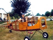 Setting in my yard when I was 17 in a home built Bobcat ultralight I was working on around 1998