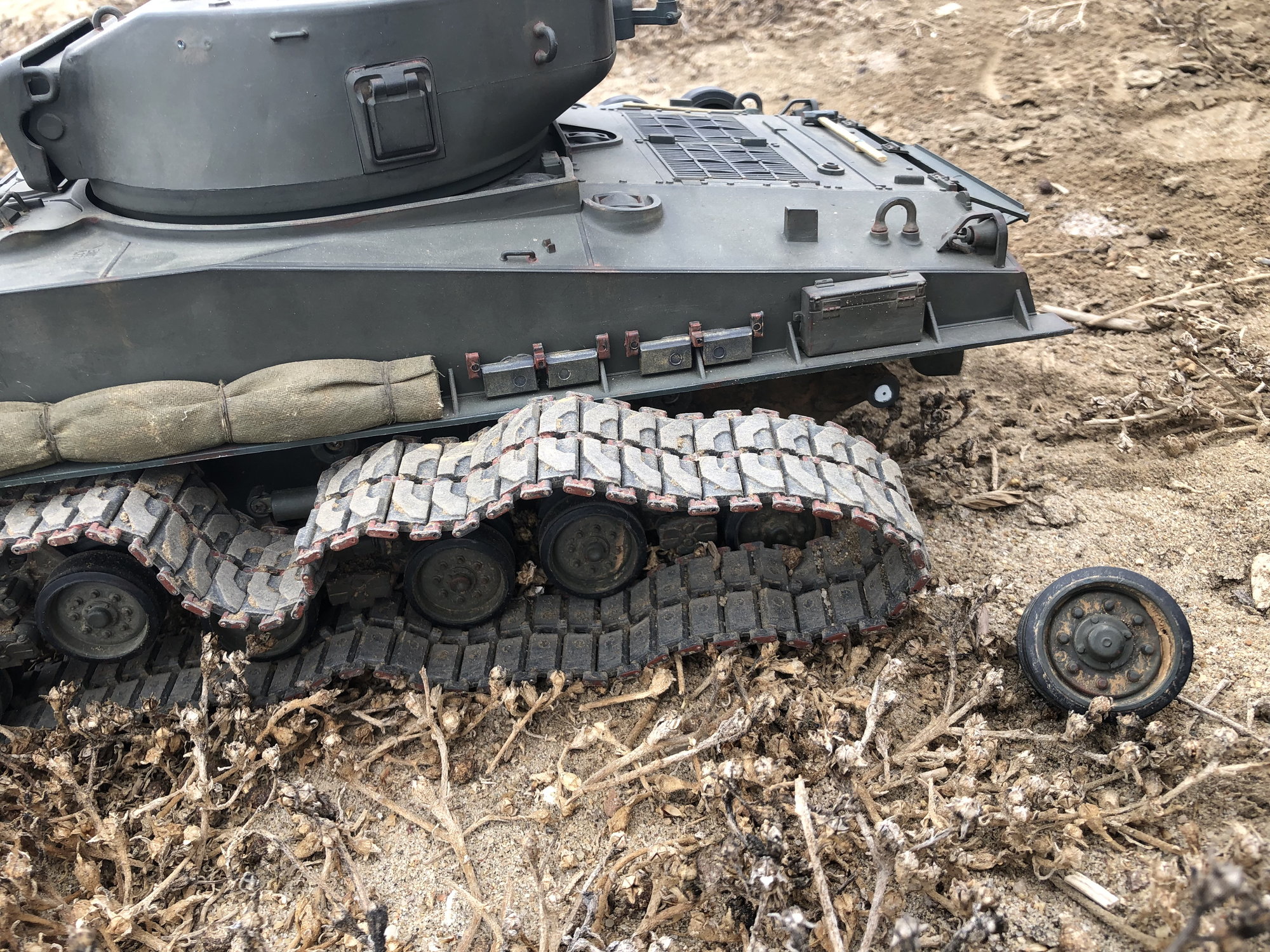 Tanks. Being tanks. - an Easy Eight M4A3E8 Sherman crossing railroad  tracks, with a bunch of logs laid on top of the tracks to made crossing  easier for the tank. This historical