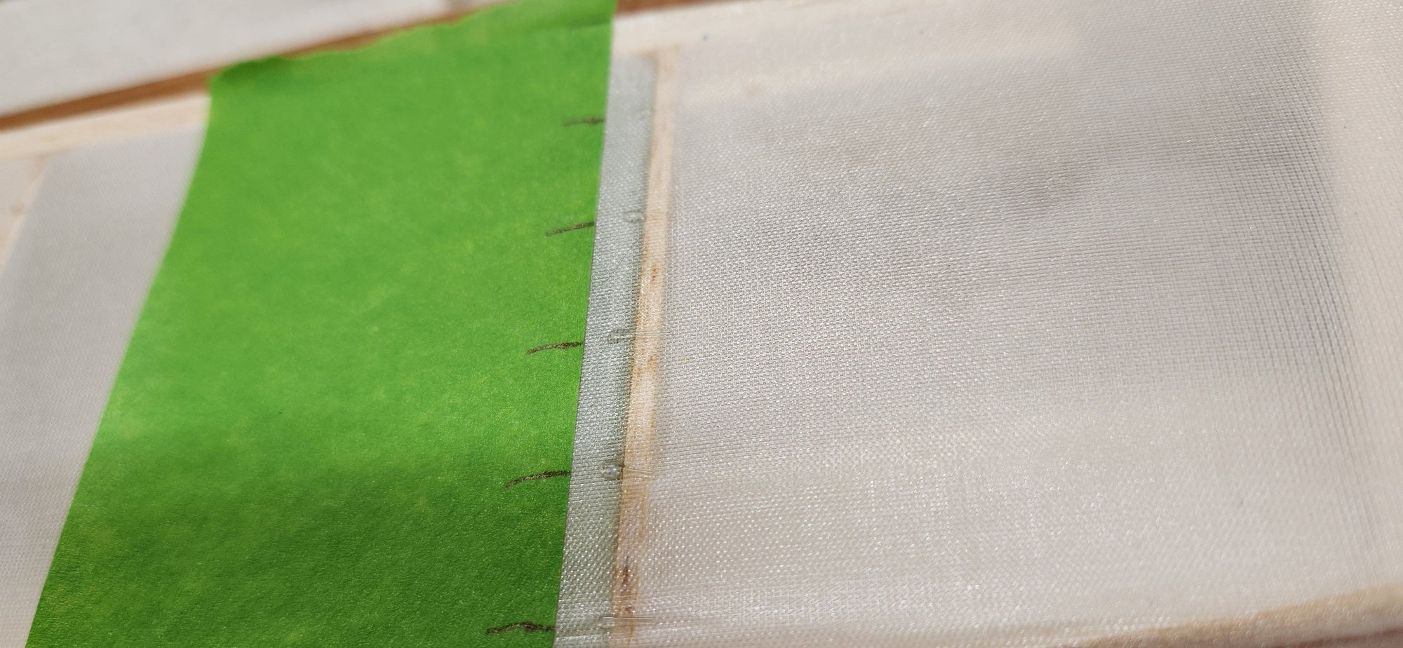 fishing line glued on with ca before taping