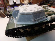 Fabricated missing lifting eyes, added cleaning kit, added brass tow rope mount, and added some slight texture to the casemate to emulate rolled steel look.