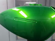A top quality brand new repro 73 Z900 kawasaki tank sprayed in house of kolor kandy lime green over fine planet green basecoat.