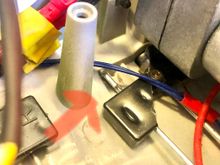 Broken torsion bar lock down cap caused by excessive movement downwards of the suspension arm. 