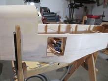 An opening was made in the right hand side of the fuselage which will serve as the rear baggage door that the full scale Bonanza had.  This scale feature will be used to hide all of the electronic switches and jacks that would normally be found on the outside of the model. 