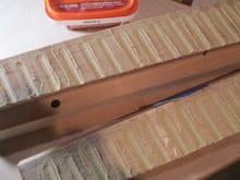 I know it looks like a hot mess, but a very thin coating of wood filler was added to each corrugation to give it the look that I was after...