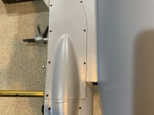 Air brake access panels mounted to bottom of fuselage 
