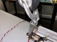 Semicircle relief cut / ground into rear of opening to allow the wheel to clear front of opening.