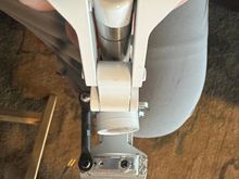 Seems who ever drilled and mounted that light got it crooked.. the Factory did this.