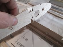 All of the ribs simply interlock together.  A very easy way to construct a wing if it's your first build.  