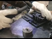 Rubber pad fixing parts and center guide spot welding