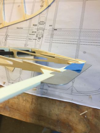 I biased the inboard end cap so that it was flush on the bottom and about 1.5mm on top to account for all the pocket space.  In this pic you see the balsa caps I put on the rib ends, most of which will be sanded away to allow for the pockets