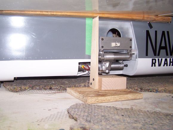 I proped the plane up on some stands to balance it. Things were way too unstable