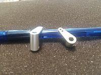 CNC made of aircraft grade aluminum and made for the the Walbro Carb brass shafts so now drill necessary.  Now control your choke as well as the trottle!