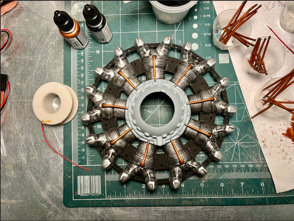 Ignition wires to front of front row cylinders.