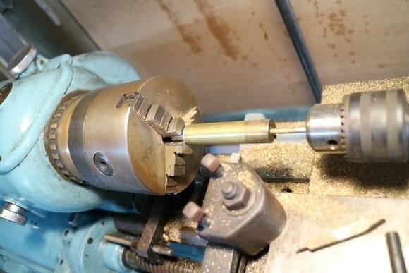 Into the lathe to cut the 4mm hole in the middle.