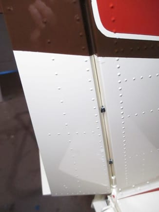 The control surface (rudder) is pushed into place until I get the correct amount of hinge gap between the rudder and fin.  I'm sure to flex the rudder both left and right, doing this will make sure that the hinges are properly aligned.  If one hinge is slightly off it will rotate itself and find its perfect center point.  