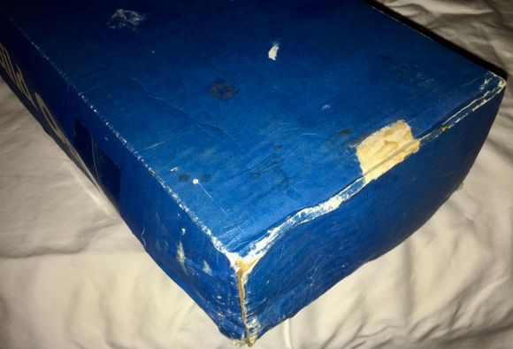 And this is what you want to know about, this end saw something wet, and cardboard doesn't keep its shape when wet.  Contents are fine.