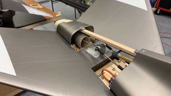 Elevator linkages moved to outside of horns for clearance.