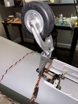 Semicircle relief cut / ground into rear of opening to allow the wheel to clear front of opening.