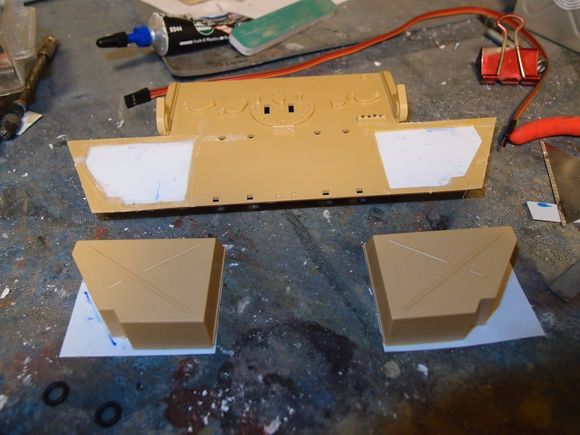 Removed the moulded on storage bins, the real ones were fitted onto brackets and sat out from the hull.