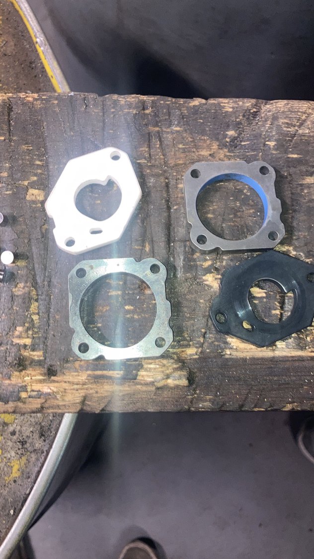 Left is the pump assy from the poor quality china pump. Has ceramic endplate and no coating on outer ring. Right is better quality item has a steel phospated end plate and some blueish coating on the ring