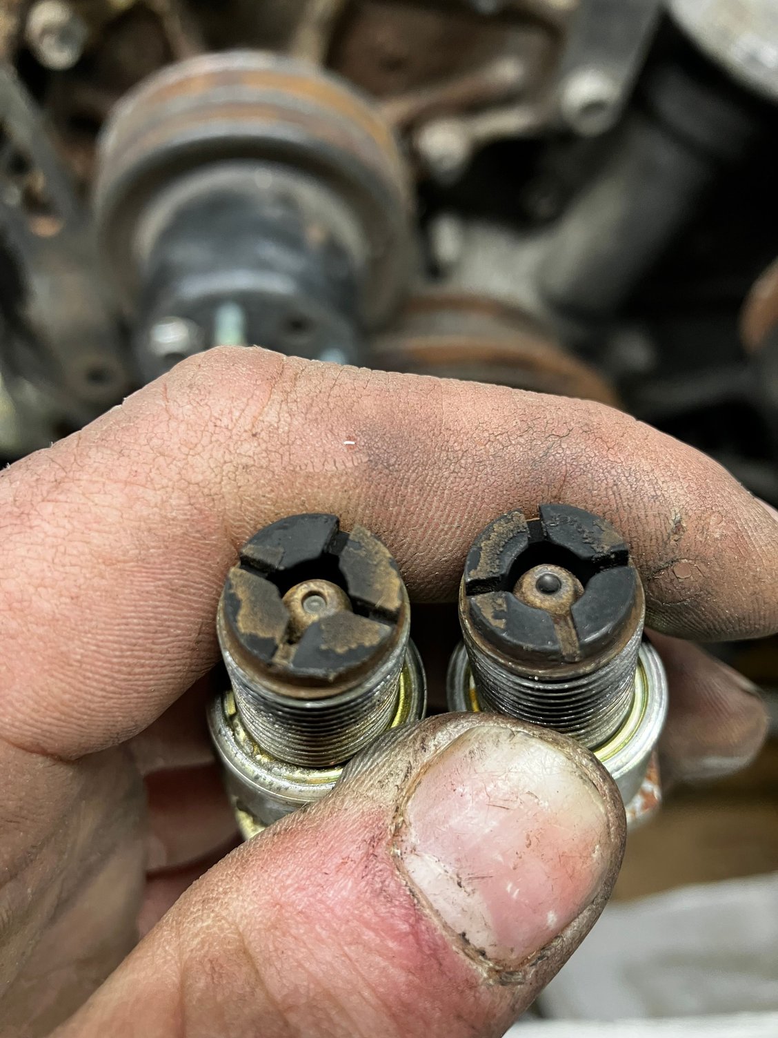 Both are lower plugs the burnt one was from the front 