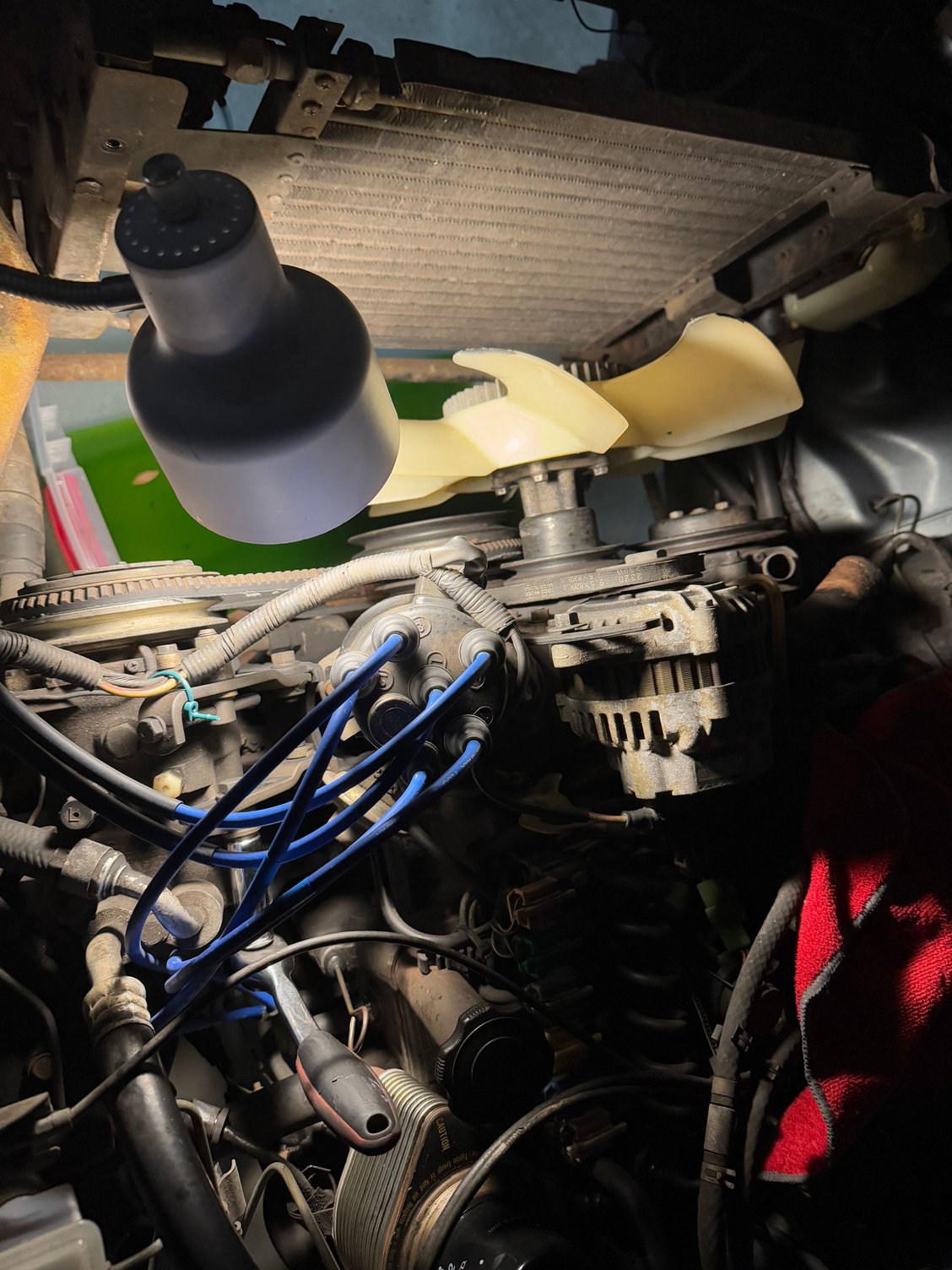 Get a bucket/drain pan and remove the radiator drain plug from the bottom of the radiator. Let this drain for and while and squeeze your top and bottom hoses. There is also a sensor on the bottom of the radiator that you can remove that will let some juice out. ALSO there is a coolant plug on the bottom of your center iron, if you follow your oil filler spout down under the car, there is a nut remove this to drain the coolant out of your engine. Clean and Reinstall the bolt.