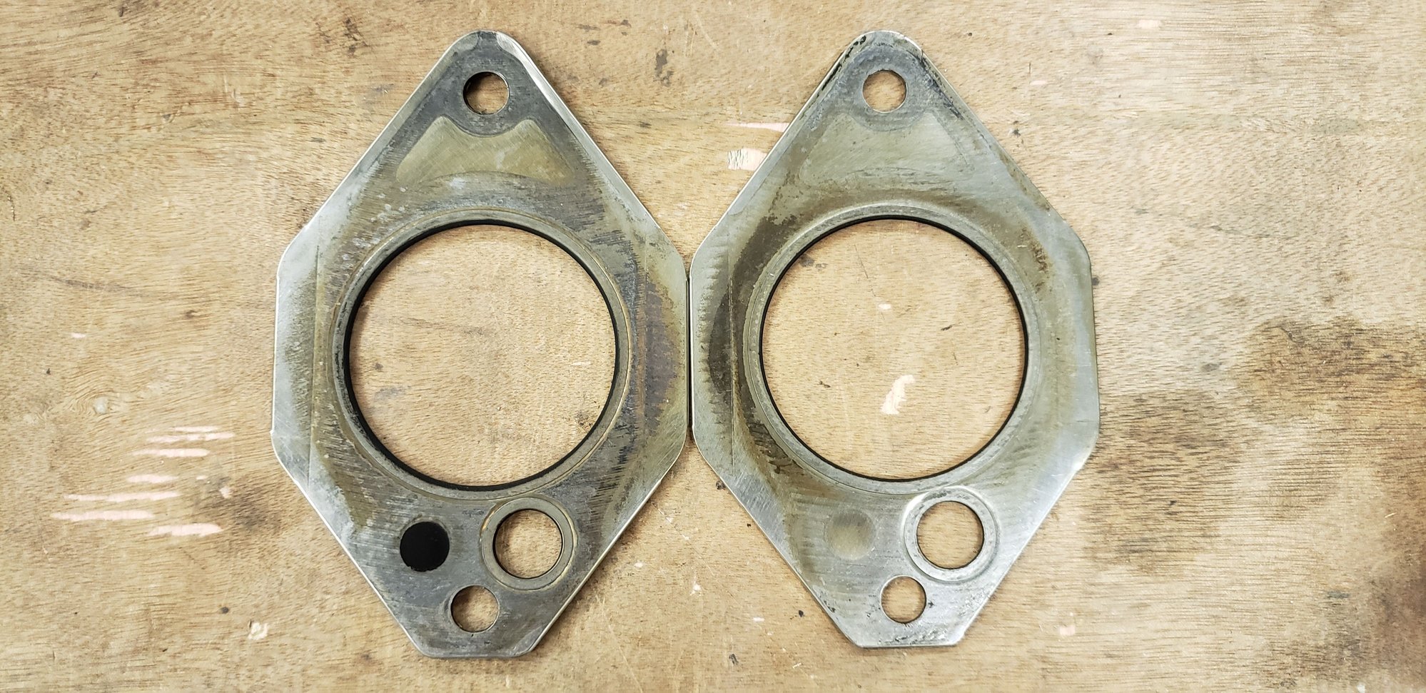 These OEM Exhaust manifold gaskets look reusable? Mazda