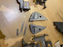Today I sandblasted the headlight brackets , door handles , brake and clutch pedal brackets .
The brake and clutch pedal brackets will just get some clear coat to prevent rust , the other items will be all powder coated in black 