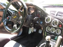 As nice as this looks in person, I would prefer a clean non-cf dash all day, and will keep my next one stock, except for a few things like a shifter, and the gauges that replace the center speaker, can't live without that : )