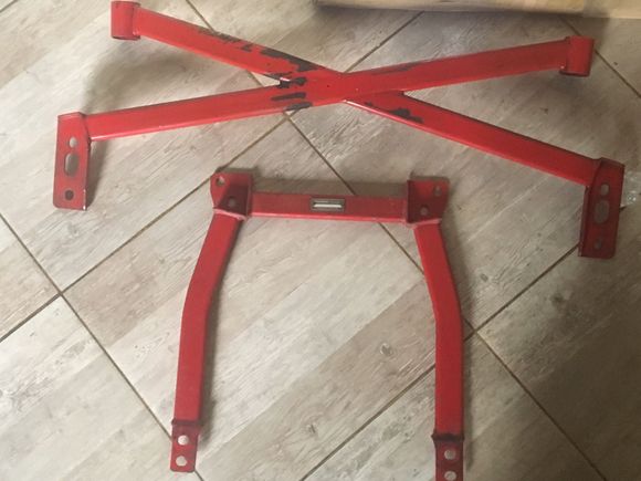 Just got my Autoexe underbody braces that I won on yahoo auctions ;) unfortunately the two triangular pieces are missing but gonna have a friend that will fabricate them for me . 
After that will sandblast and powder coat them again in red so they look like new again 