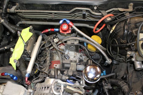Engine bay TB + UIM removed and fuel lines disconnected.